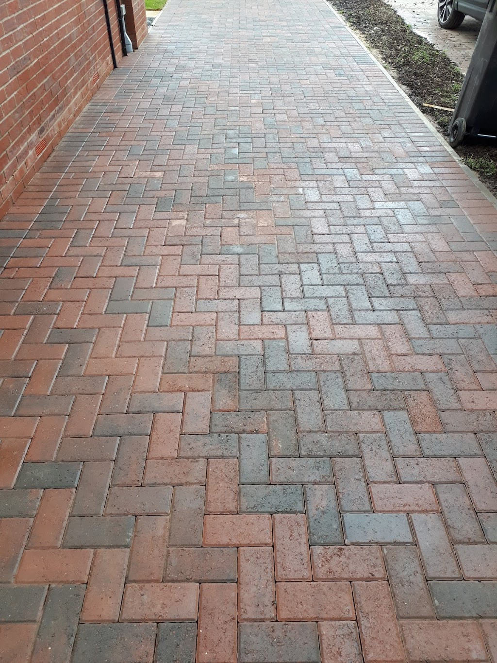 Driveway after professional cleaned and treated