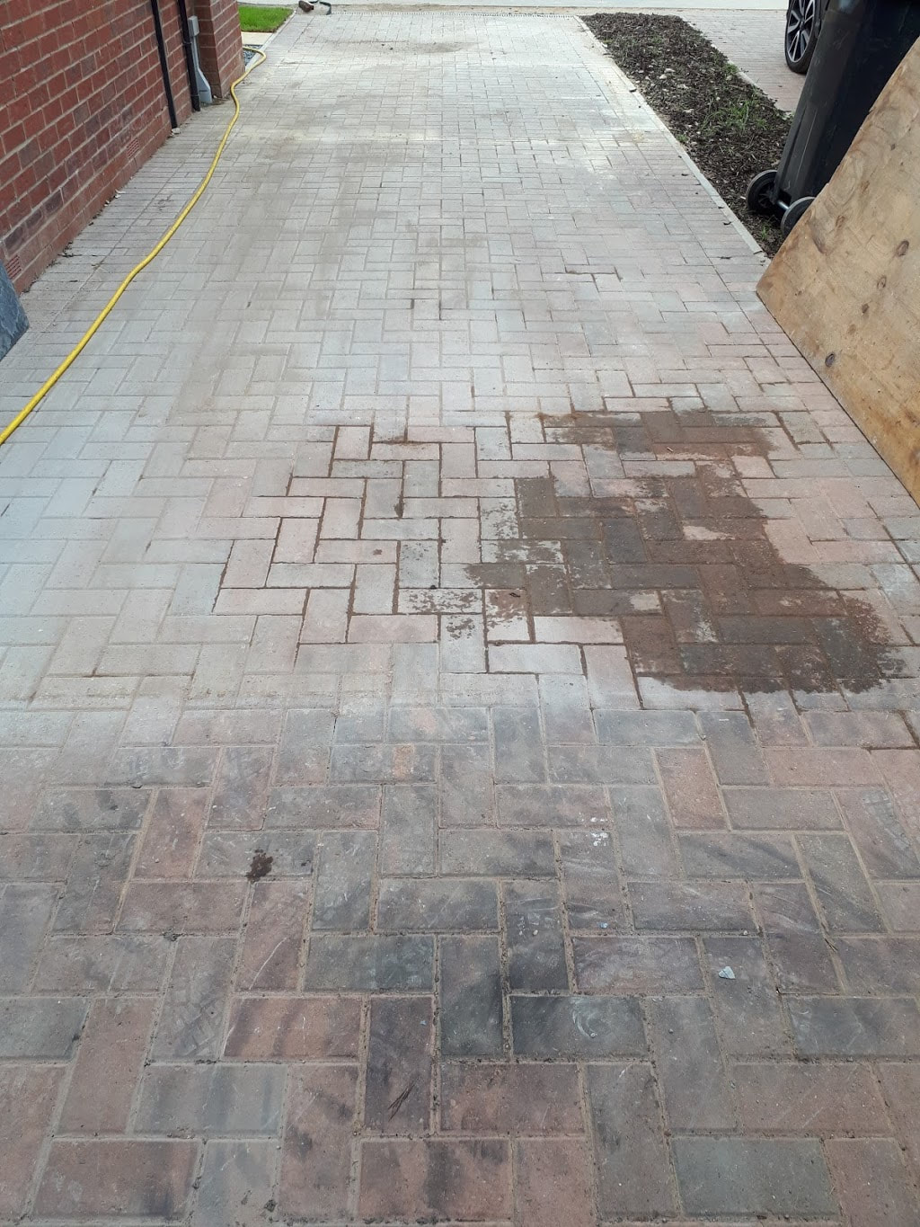 Block paving before being professionally cleaned