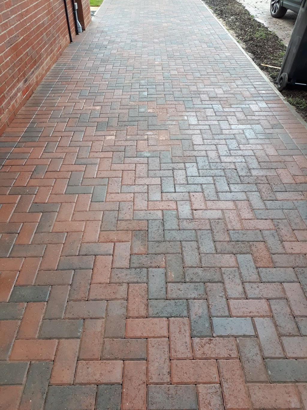 driveway after professional cleaned and treated