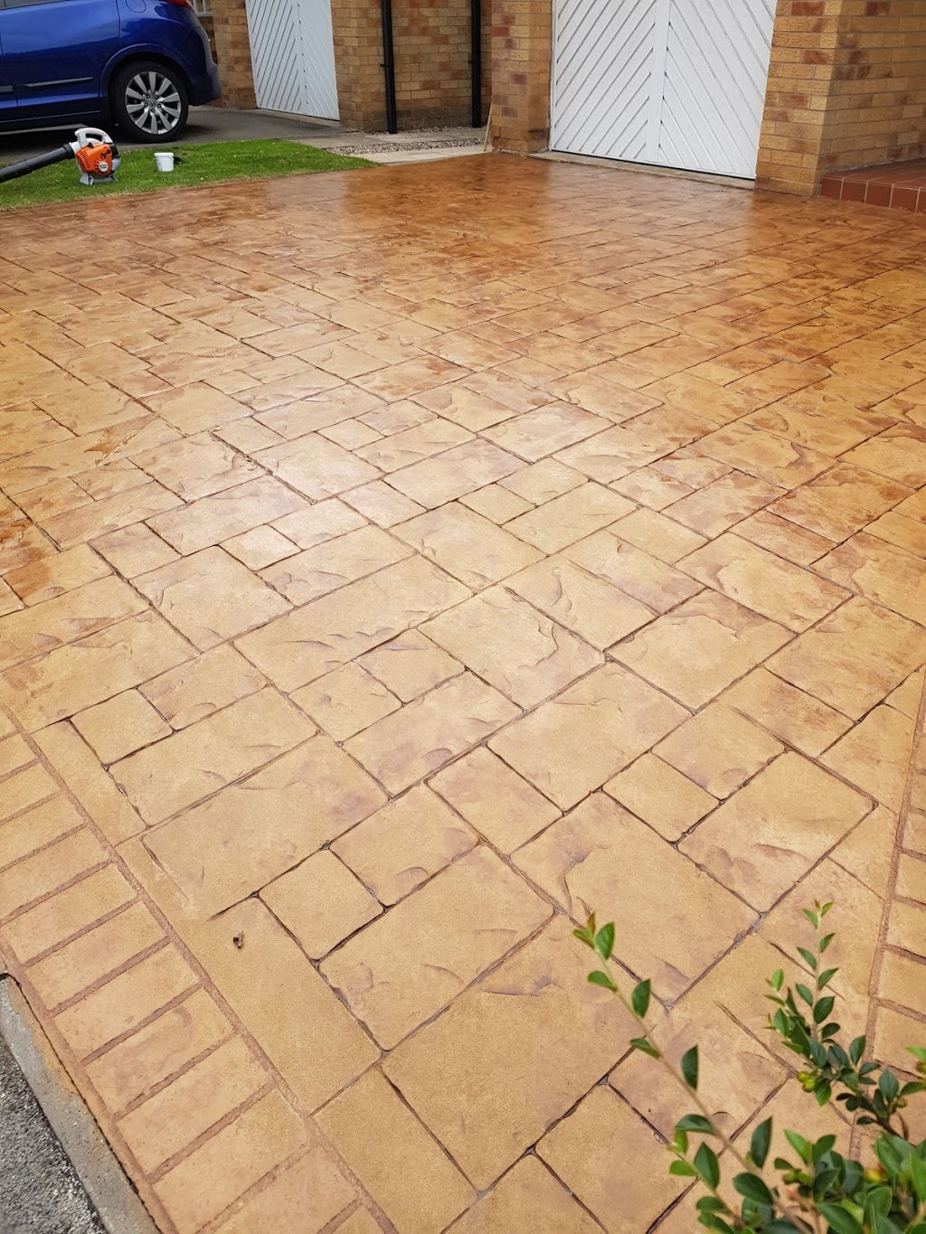 imprinted concrete after being cleaned and sealed
