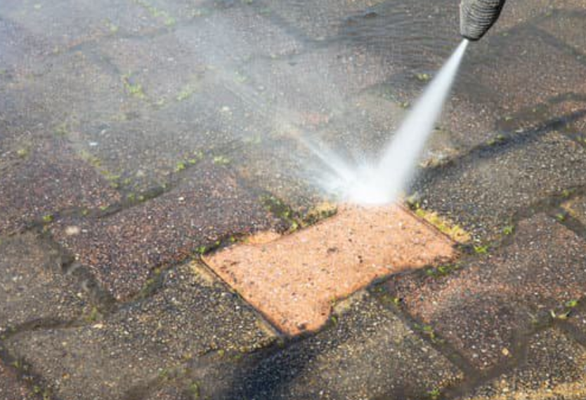 Driveway cleaning for oil stain removal