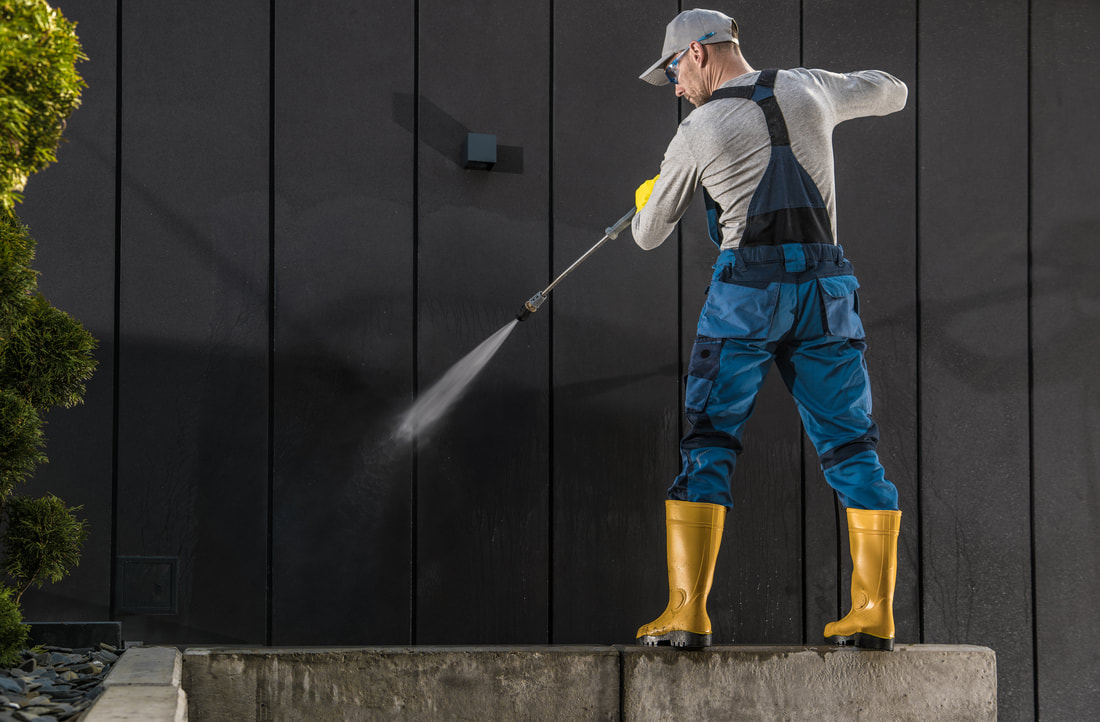 Pressure washing a driveway